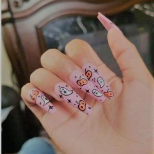 retro pink pastel goth halloween unique pumpkin and ghost long coffin nails